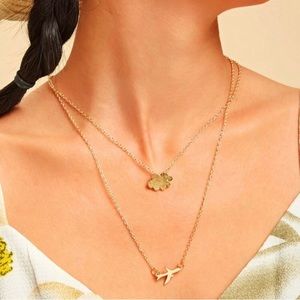 Gold layered plane and cloud necklace